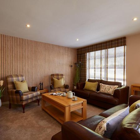 Macdonald Woodland Lodges At Macdonald Aviemore Resort Exterior foto